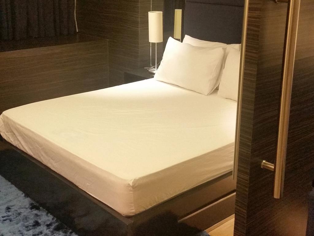 Shang Luxury Suites Mandaluyong Phòng bức ảnh