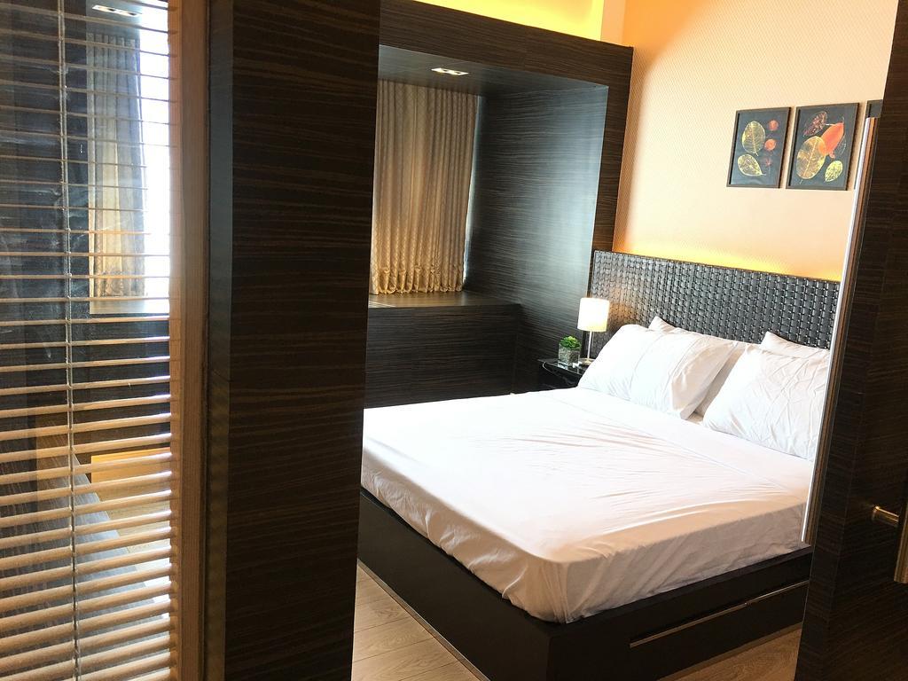 Shang Luxury Suites Mandaluyong Phòng bức ảnh