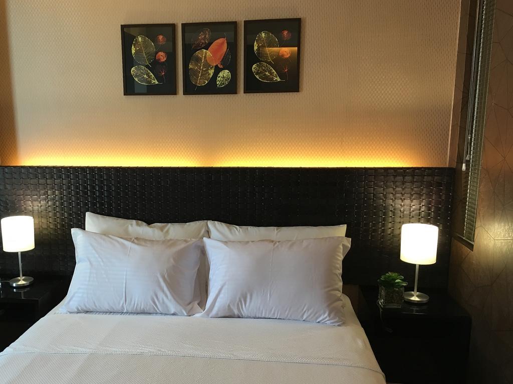 Shang Luxury Suites Mandaluyong Phòng bức ảnh