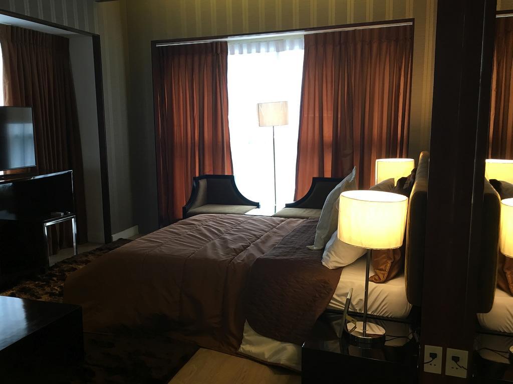 Shang Luxury Suites Mandaluyong Phòng bức ảnh